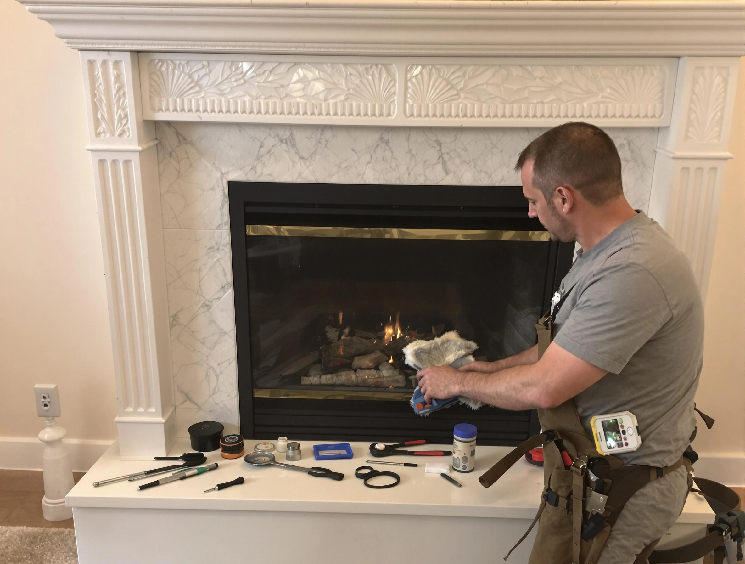 Marlborough Chimney Sweep performing fireplace maintenance in Marlborough, MA